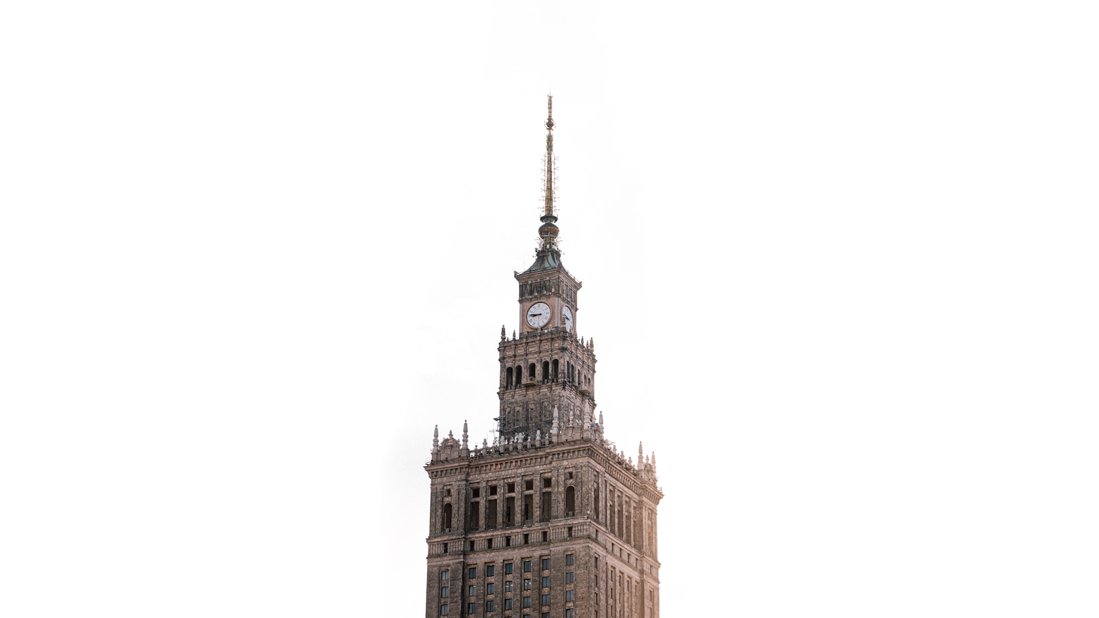 a tall building with a clock on the top of it